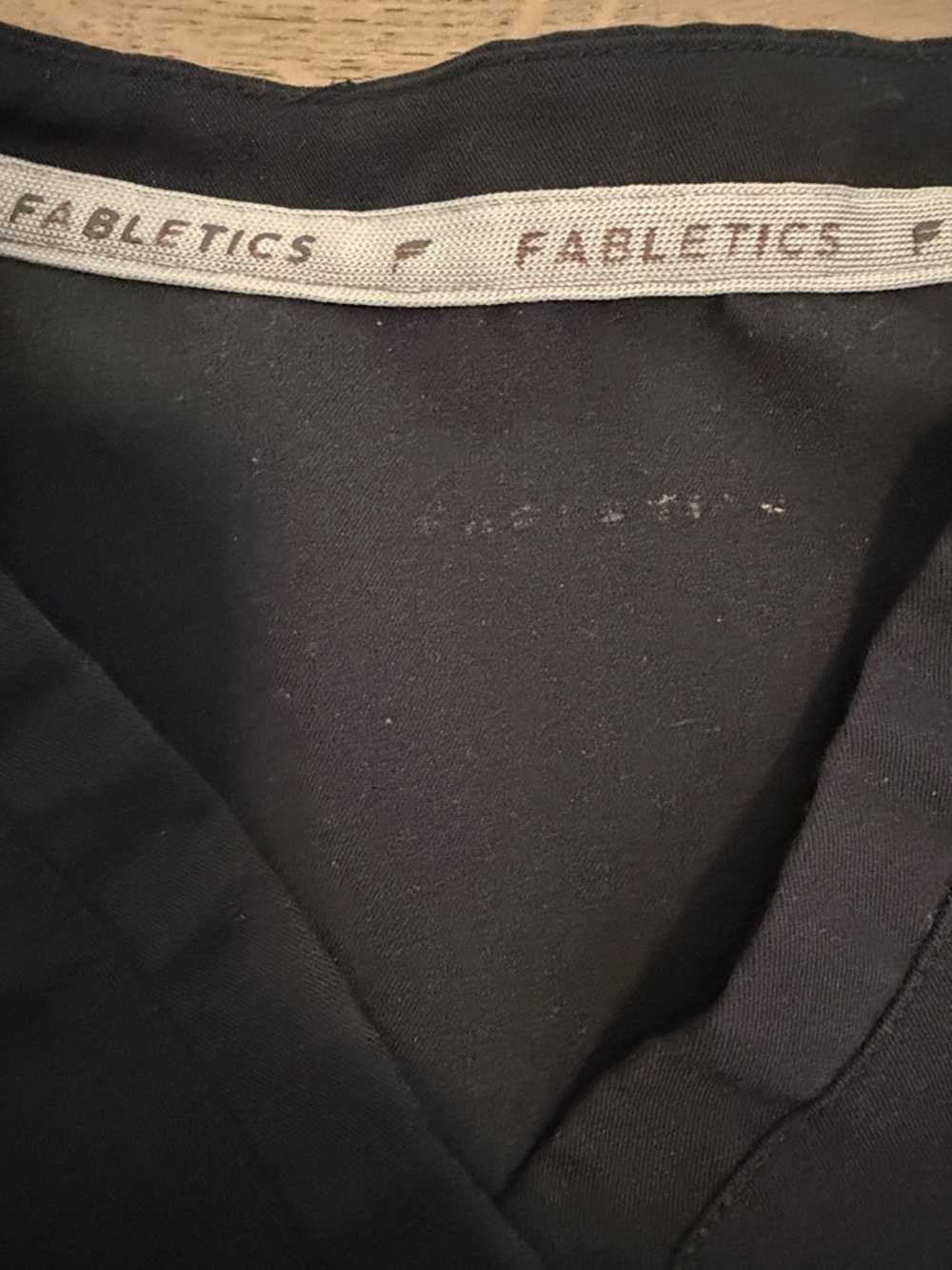 Fabletics Vital Scrub Top in Black - Picture 6 of 7